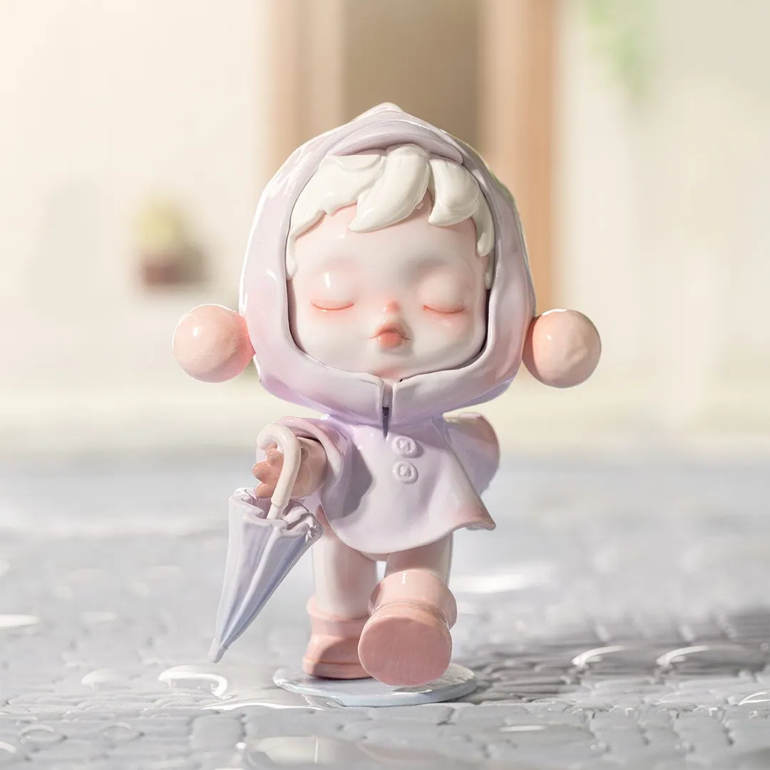 Skullpanda The Raining Day figure holding an umbrella on wet pavement — official Pop Mart scene for the Warmth series